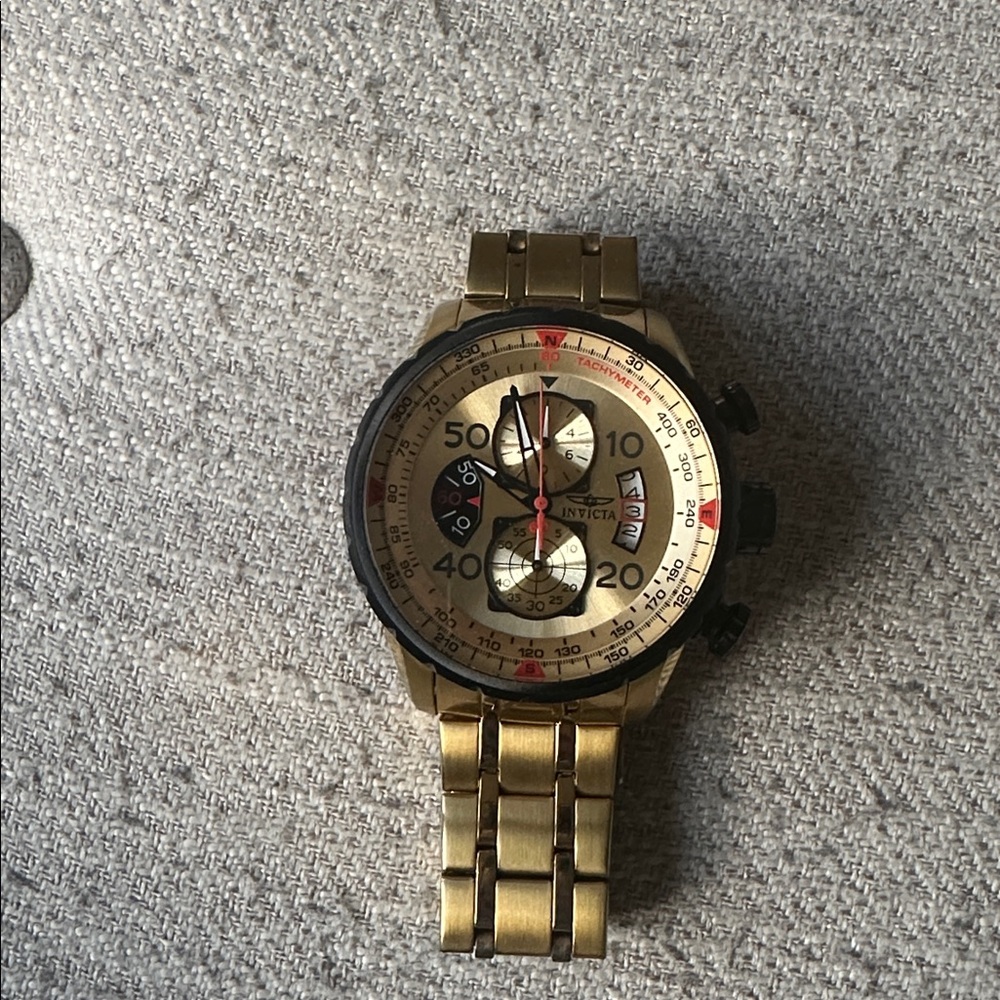 Invicta Gold and Black Chronograph Watch